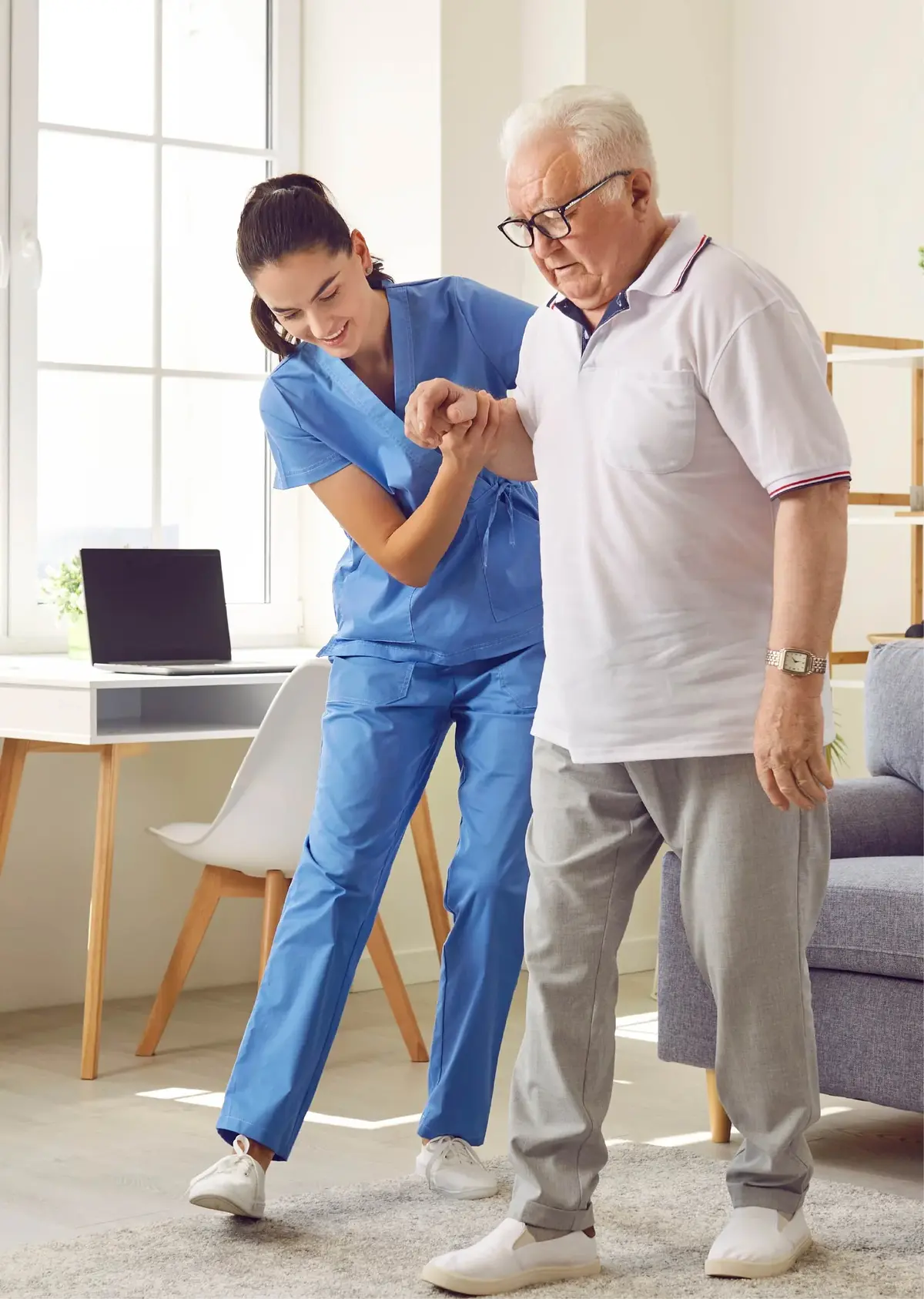 Therapist assisting stroke patient with mobility exercises
